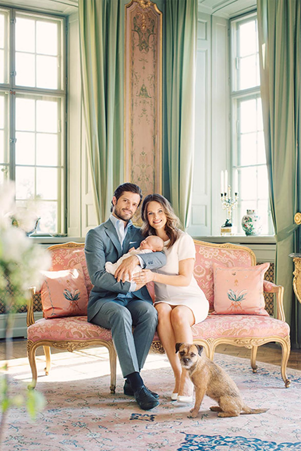 Prince Carl Philip and Princess Sofia of Sweden pose with their newborn son Prince Alexander in one of the the sitting room's in Drottningholm Palace, Sweden.