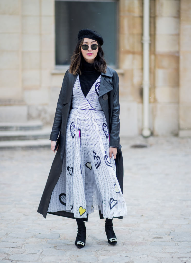 PARIS, FRANCE - FEBRUARY 27: Chriselle Lim wearing beret, trench coat, dress is seen outside Dior on February 27, 2018 in Paris, France. (Photo by Christian Vierig/Getty Images)