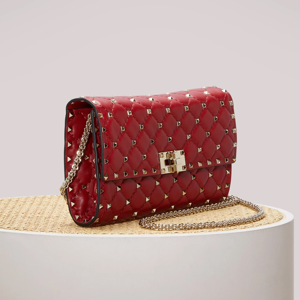Valentino ‘Rockstud Baguette’ clutch, $2156 from 24 Sevres-closet-staples-everyone-should-own-gallery_1000x1000