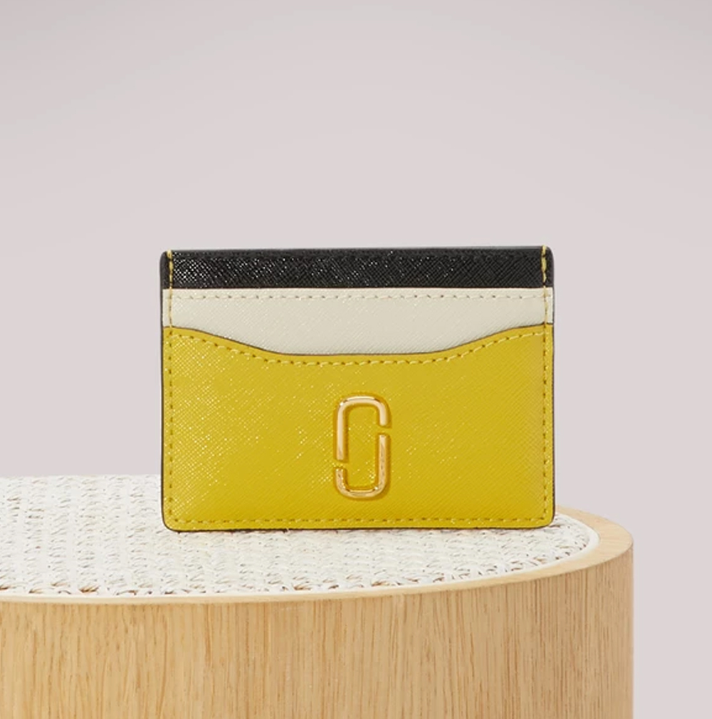 Our pick: Marc Jacobs Snapshot Card Case, $75 from  24 Sevres