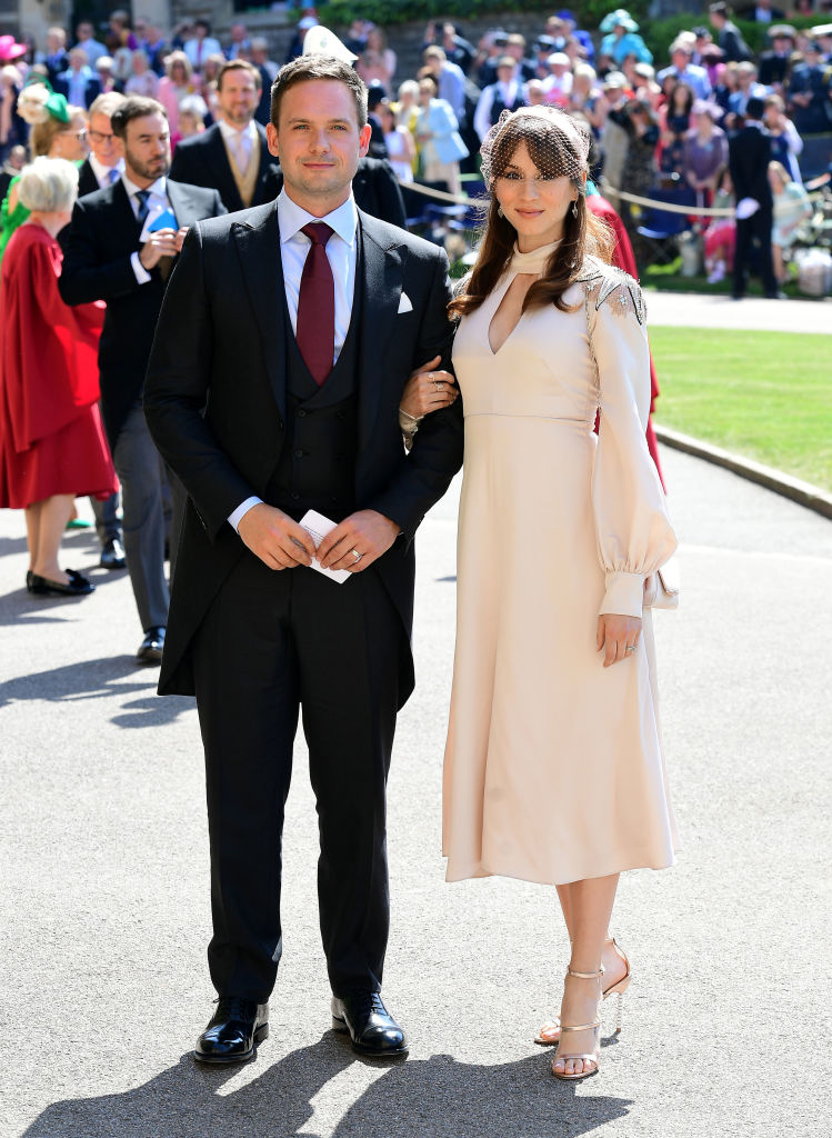 WINDSOR, UNITED KINGDOM - MAY 19: Actor Patrick J. Adams and wife Troian Bellisario arrive at St George's Chapel at Windsor Castle before the wedding of Prince Harry to Meghan Markle on May 19, 2018 in Windsor, England. (Photo by Ian West - WPA Pool/Getty Images)