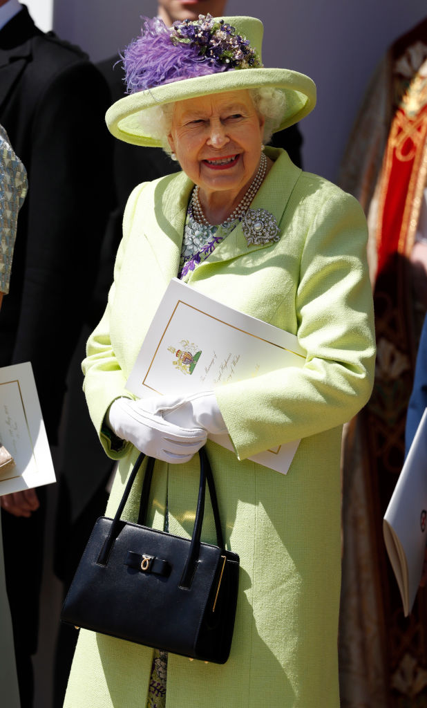 WINDSOR, UNITED KINGDOM - MAY 19: Queen Elizabeth II smiles after the wedding of Prince Harry and Meghan Markle at St George's Chapel at Windsor Castle on May 19, 2018 in Windsor, England. (Photo by Alastair Grant - WPA Pool/Getty Images)