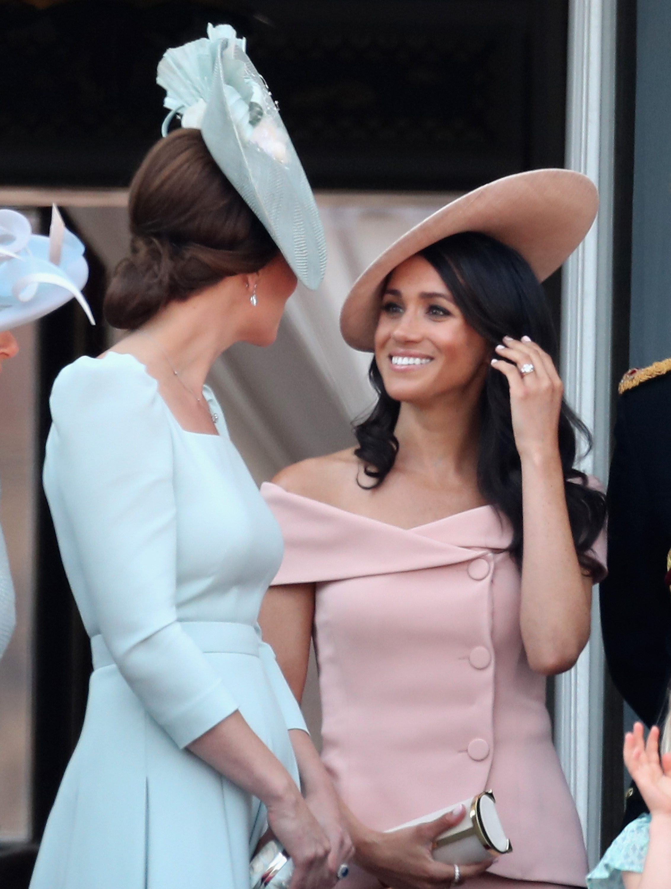 LONDON, ENGLAND - JUNE 09: Meghan, Duchess of Sussex and Catherine, Duchess of Cambridge watch the flypast on the balcony of Buckingham Palace during Trooping The Colour on June 9, 2018 in London, England. The annual ceremony involving over 1400 guardsmen and cavalry, is believed to have first been performed during the reign of King Charles II. The parade marks the official birthday of the Sovereign, even though the Queen's actual birthday is on April 21st. (Photo by Chris Jackson/Getty Images)
