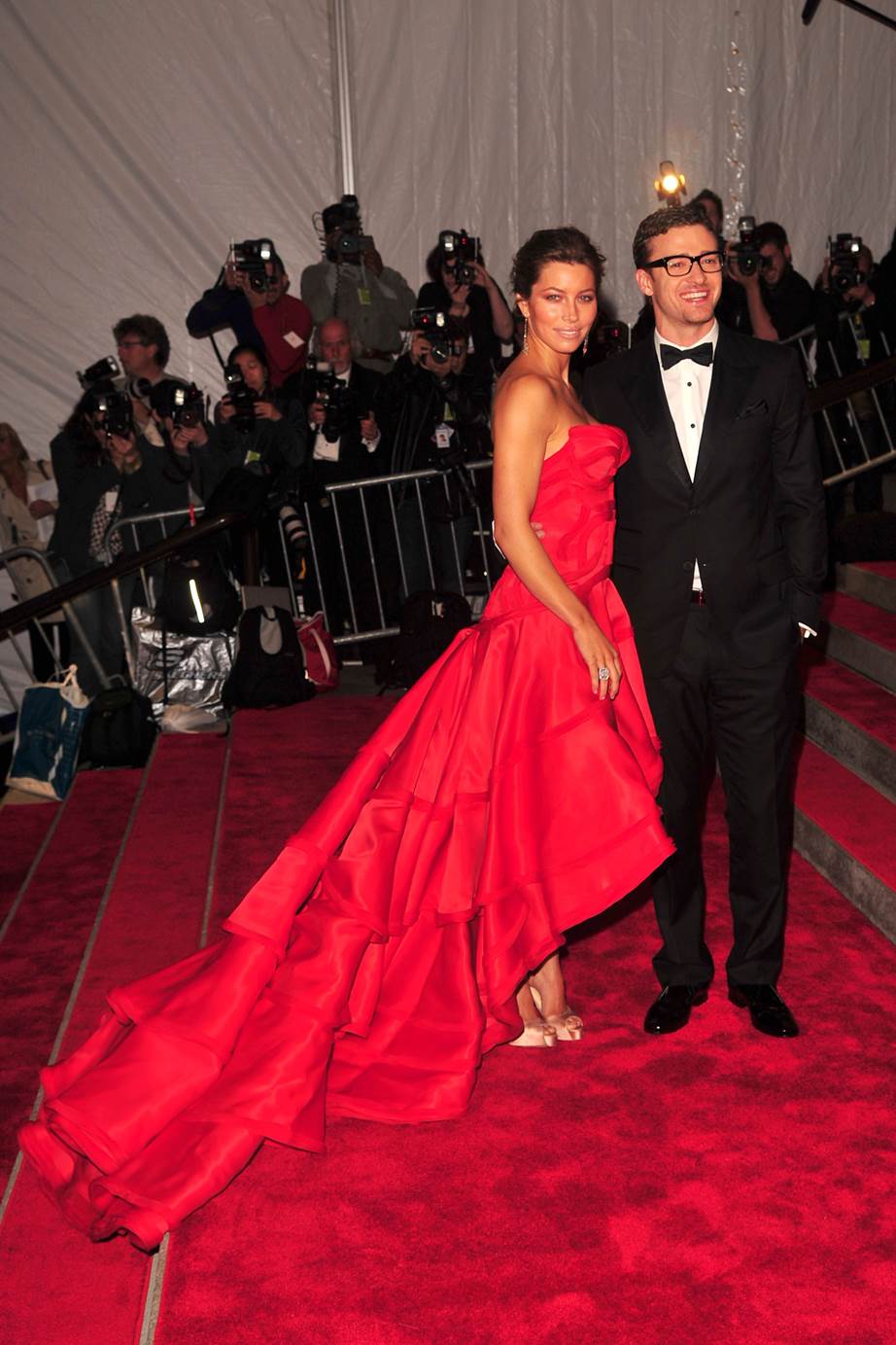 Jessica Biel and Justin Timberlake, 2009 Jessica Biel wore red Versace back before the dancing lady emoji was a thing in 2009, while Justin Timberlake wore a suit from his own line, William Rast.