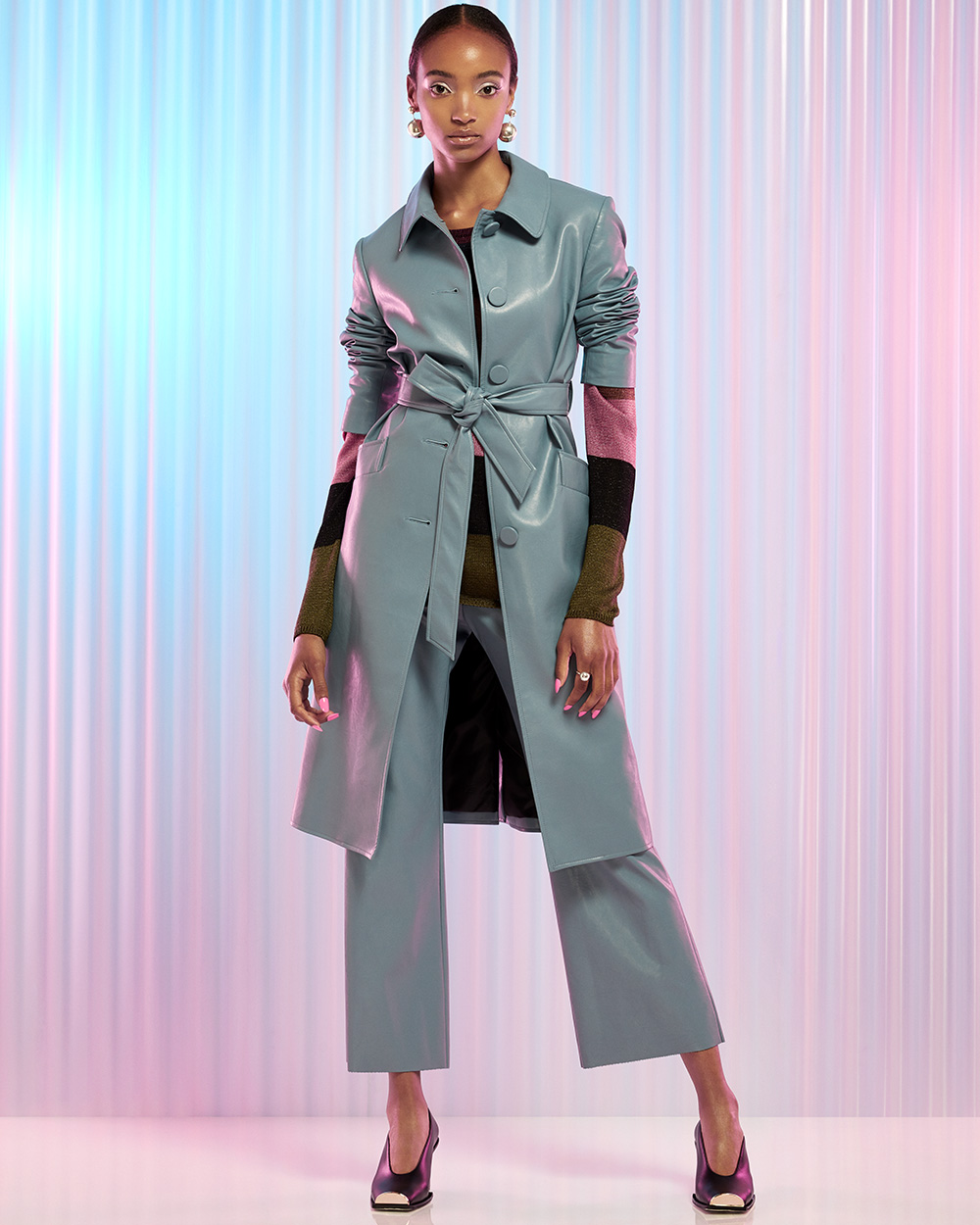 Kate Sylvester coat, $799, pants, $479, and sweater, $279. Stella McCartney shoes, $890, from Runway Shoes. Jasmin Sparrow earrings, $299, and ring, $189.