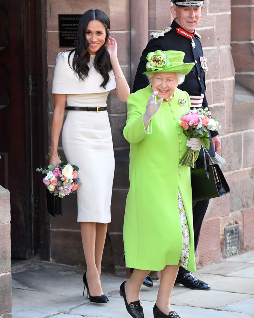 June 14, 2018: Meghan opts for a lovely ivory pencil dress by Givenchy for her first engagement as the Duchess of Sussex with Queen Elizabeth. 