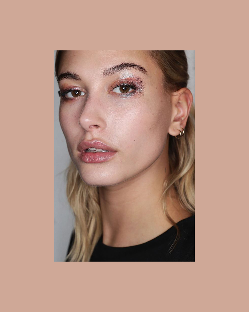 MFQ: Beauty looks for a night out | Day or night, subtle or spectacular, glitter is all go this season. If you want to play it safe, take cues from this look seen on Hayley Baldwin which uses the glitter to add a nonchalant glam rock vibe to a neutral shadow palette.