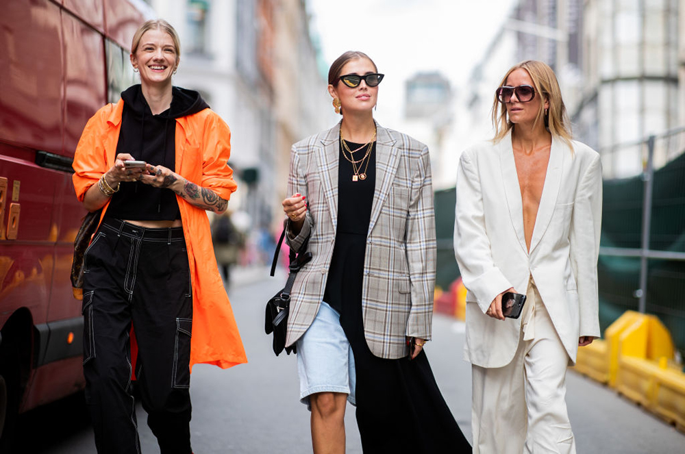 OSLO, NORWAY - AUGUST 15: Marianne Theodorsen, Darja Barannik wearing checked blazer and Celine Aagaard seen outside Pia Tjelta during Oslo Runway SS19 on August 15, 2018 in Oslo, Norway. (Photo by Christian Vierig/Getty Images)