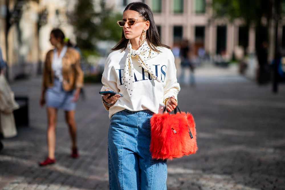 OSLO, NORWAY - AUGUST 15: A guest wearing cropped denim jeans is seen outside Michael Olestad during Oslo Runway SS19 on August 15, 2018 in Oslo, Norway. (Photo by Christian Vierig/Getty Images)