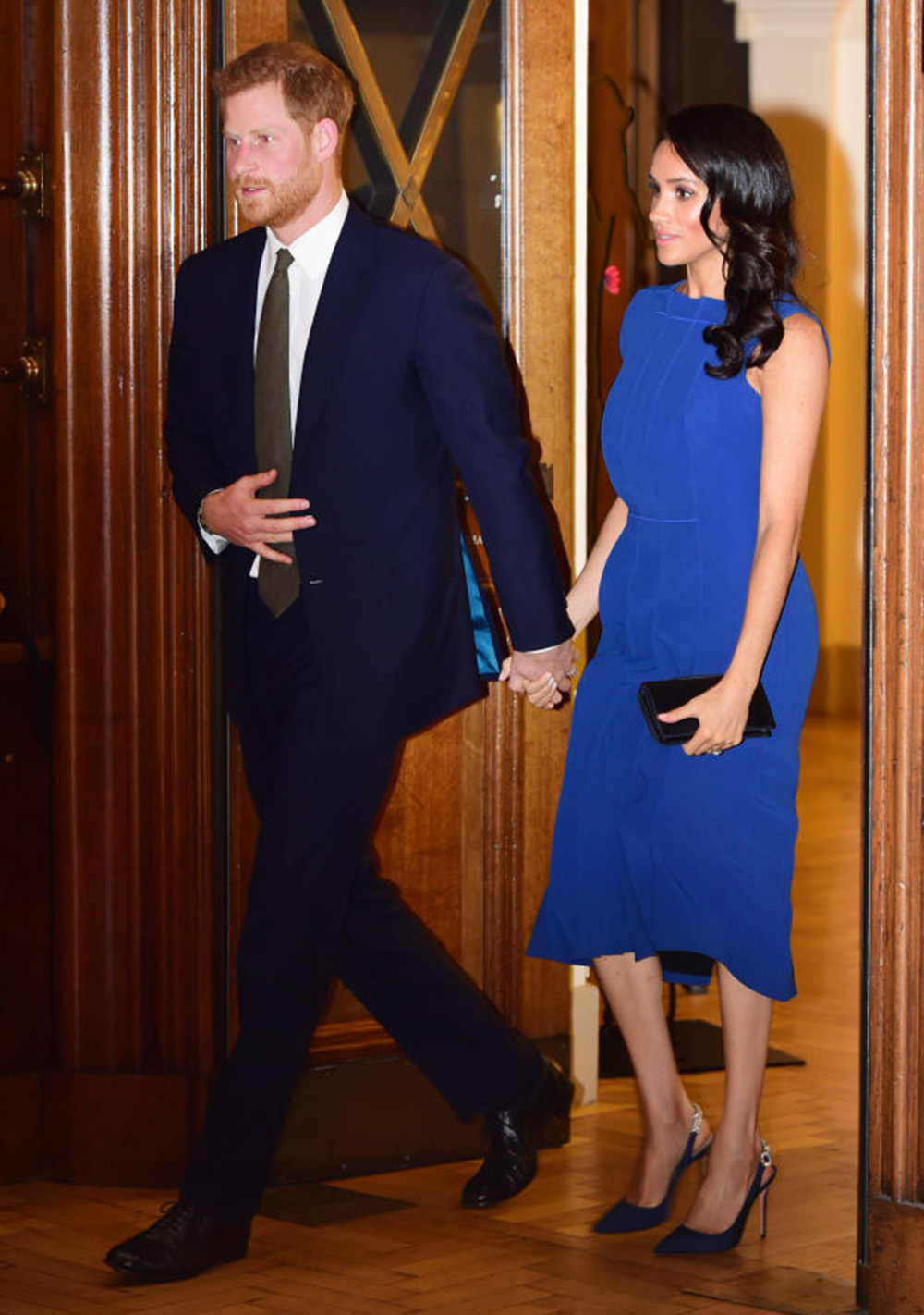 September 6, 2018: Looking bold in blue, Meghan, Duchess of Sussex breaks her suiting streak with a Jason Wu number with a flounce detail down the centre front (enter, the pregnancy rumours!). Meghan accessorised with go-to shoe designer Aquazzura this time with a rhinestone detail across the backstrap and a clutch by Dior attending the ‘100 Days of Peace’ concert in London.