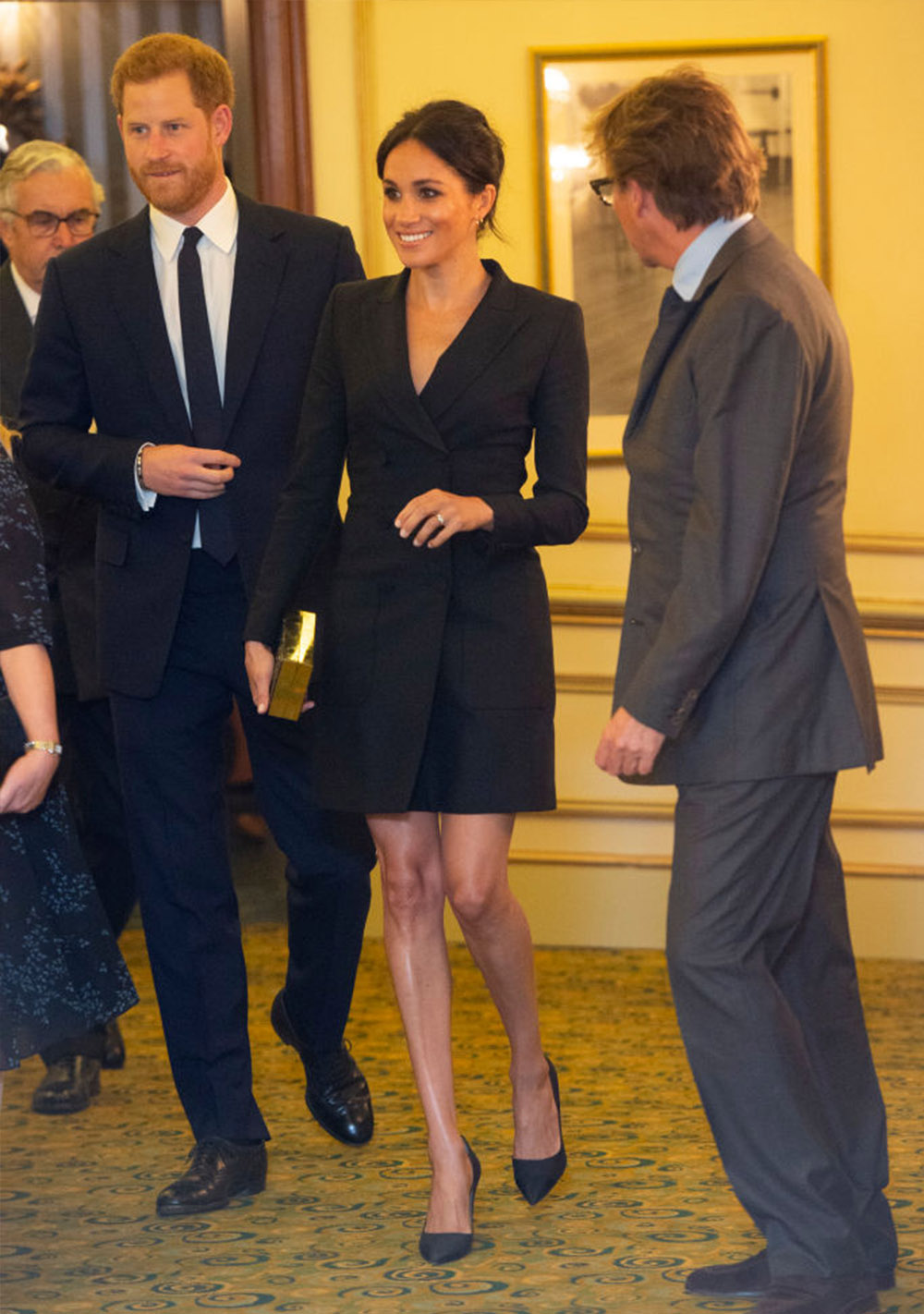 August 29, 2018: Back in black, Meghan, Duchess of Sussex, accompanies husband Prince Harry, Duke of Sussex to a performance of ‘Hamilton’ wearing an oh-so-sophisticated Judith & Charles tuxedo dress *swoon* with Stuart Weitzman pumps. Another one knocked out of the park from the Duchess!