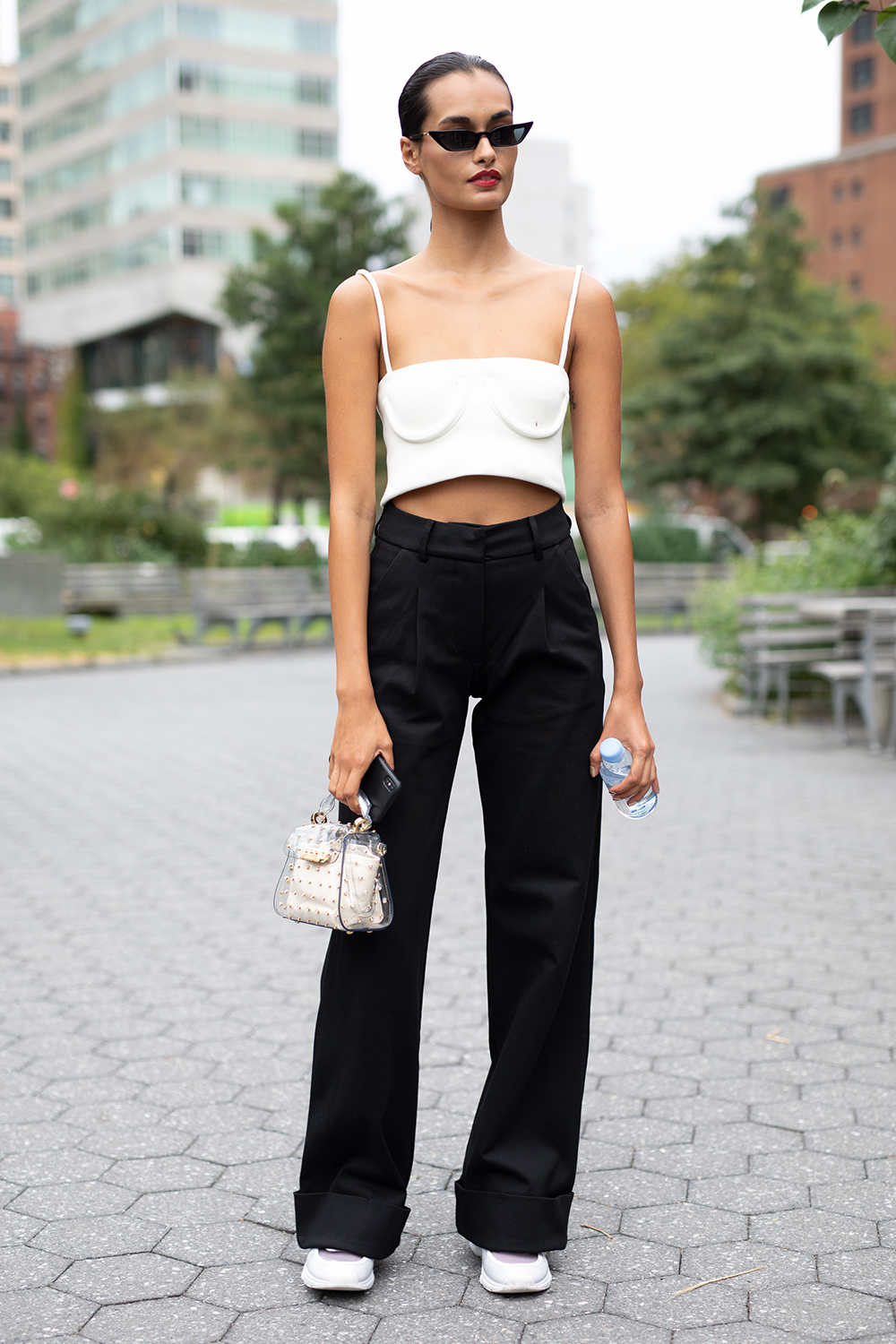 NEW YORK, NY - SEPTEMBER 07: Gizele Oliveira is seen on the street during New York Fashion Week SS19 wearing white top with black pants on September 7, 2018 in New York City. (Photo by Matthew Sperzel/Getty Images)