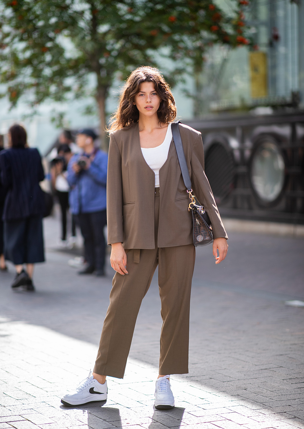 LONDON, ENGLAND - SEPTEMBER 16: Model Georgia Fowler wearing brown suit, cropped top is seen outside Roland Mouret during London Fashion Week September 2018 on September 16, 2018 in London, England. (Photo by Christian Vierig/Getty Images)