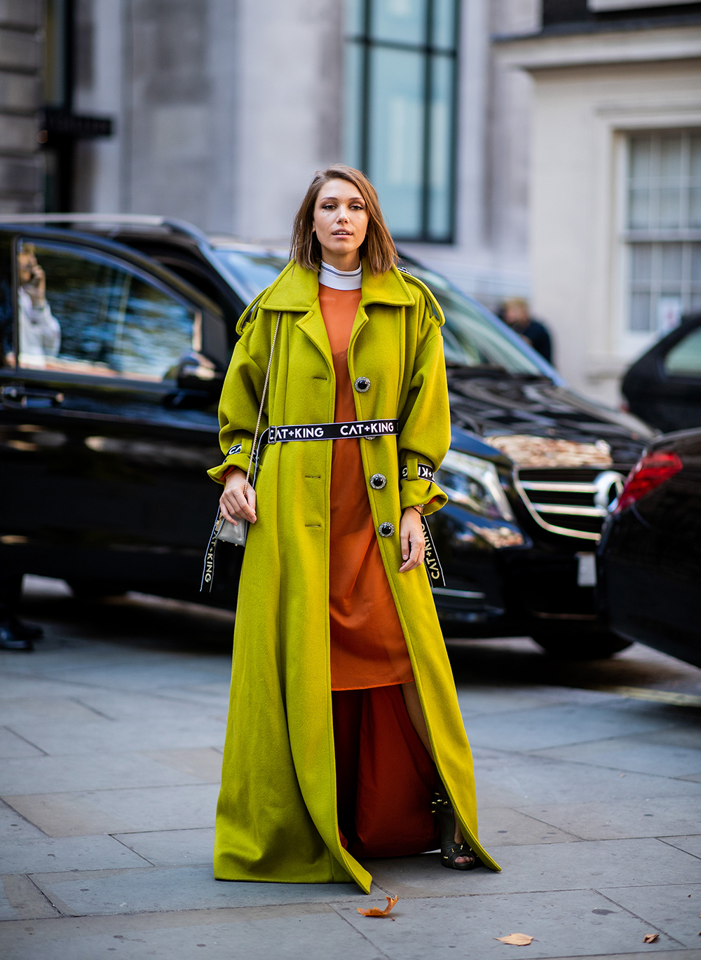 LONDON, ENGLAND - SEPTEMBER 17: A guest wearing green wool coat is seen outside Erdem during London Fashion Week September 2018 on September 17, 2018 in London, England. (Photo by Christian Vierig/Getty Images)