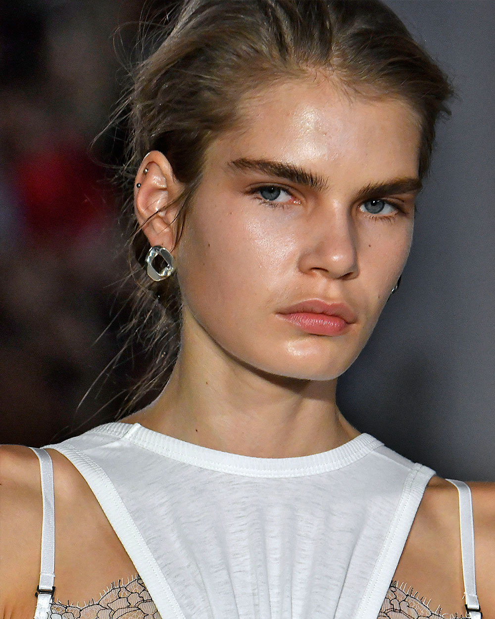 The best beauty looks from NYFW Dion Lee Clean, dewy skin and cool girl updo's were the order of the day at Dion Lee. In one of our favourite hair hacks from the season so far, GHD ambassador Eugene Souleiman added 12 teeny tiny 'hidden braids' into each style. It's all in the detail after all.