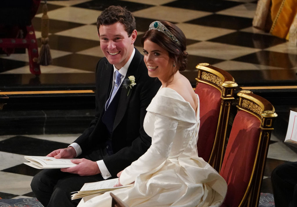 WINDSOR, ENGLAND - OCTOBER 12: Jack Brooksbank and Princess Eugenie of York during their wedding ceremony at St. George's Chapel on October 12, 2018 in Windsor, England. (Photo by Owen Humphreys - WPA Pool/Getty Images)
