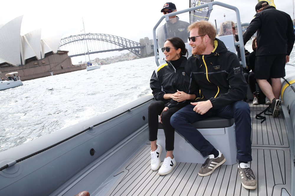 SYDNEY, AUSTRALIA - OCTOBER 21: Prince Harry, Duke of Sussex and Meghan, Duchess of Sussex on Sydney Harbour looking out at Sydney Opera House and Sydney Harbour Bridge during day two of the Invictus Games Sydney 2018 at Sydney Olympic Park on October 21, 2018 in Sydney, Australia. (Photo by Chris Jackson/Getty Images for the Invictus Games Foundation)