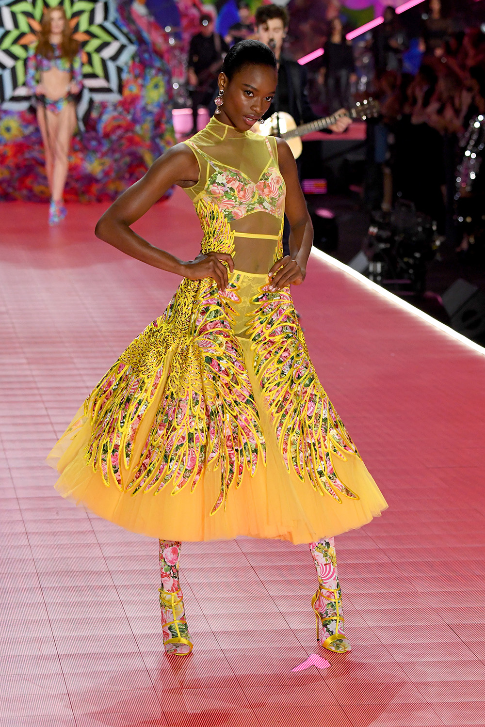 NEW YORK, NY - NOVEMBER 08: Mayowa Nicholas walks the runway while Shawn Mendes performs during the 2018 Victoria's Secret Fashion Show at Pier 94 on November 8, 2018 in New York City. (Photo by Kevin Mazur/WireImage)
