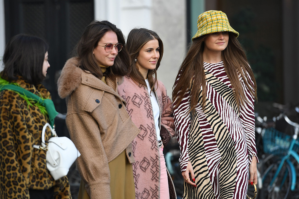 10 street style moments that prove the bucket hat trend is an instant outfit game-changer | Mandatory Credit: Photo by REX/Shutterstock (10077526g) Street Style Street Style, Fall Winter 2019, Copenhagen Fashion Week, Denmark - 30 Jan 2019