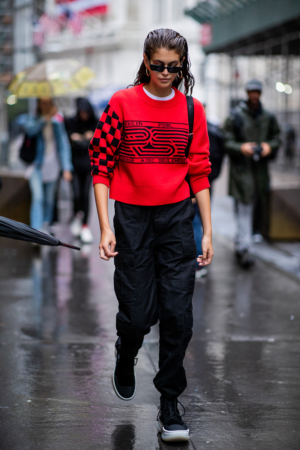 Precious Cargo: The practical pant trend that’s replacing your mom jeans (and fast) | NEW YORK, NY - SEPTEMBER 10: Model Kaia Gerber wearing red sweater, black pants is seen outside Proenza Schouler during New York Fashion Week Spring/Summer 2019 on September 10, 2018 in New York City. (Photo by Christian Vierig/Getty Images)