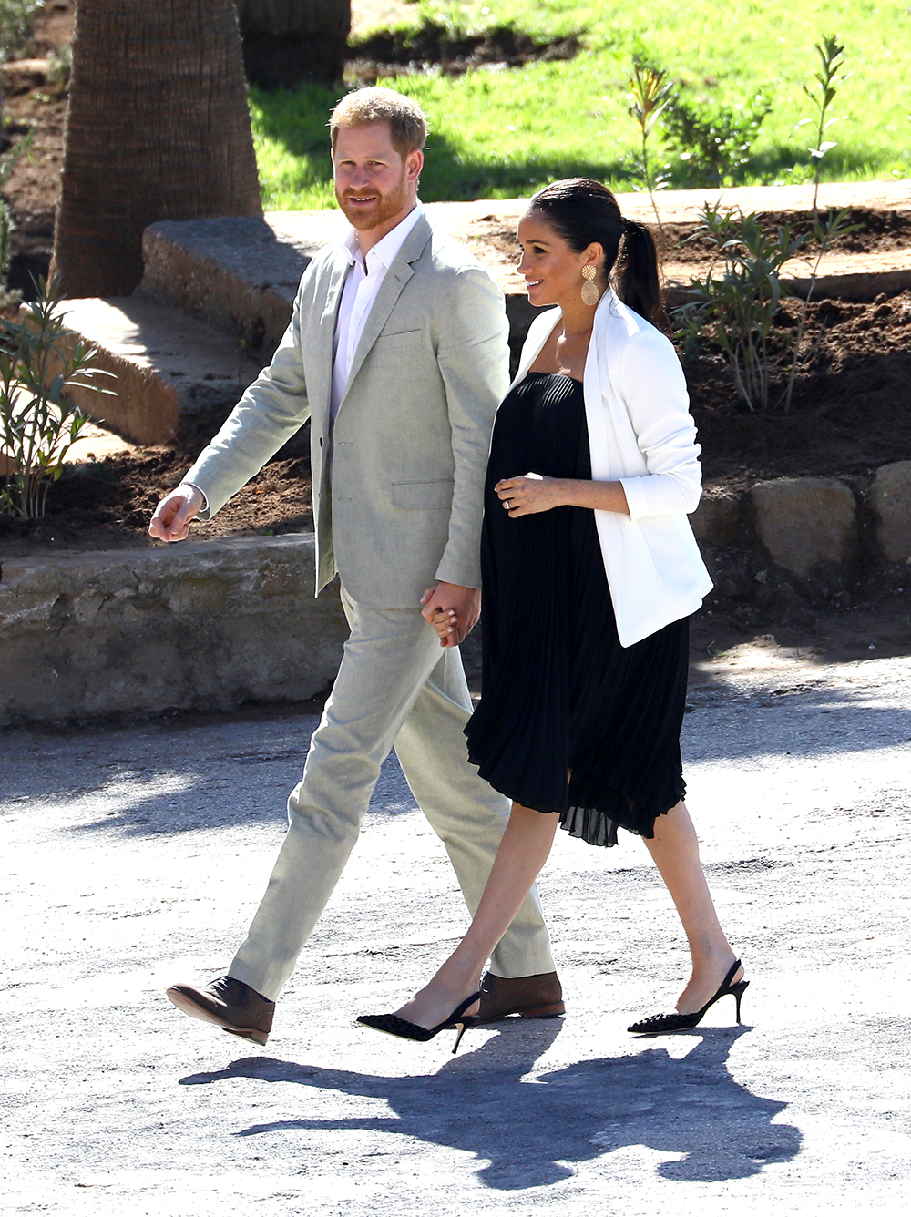 RABAT, MOROCCO - FEBRUARY 25: Prince Harry, Duke of Sussex and Meghan, Duchess of Sussex walk through the walled public Andalusian Gardens which has exotic plants, flowers and fruit trees during a visit on February 25, 2019 in Rabat, Morocco. (Photo by Tim P. Whitby/Getty Images)