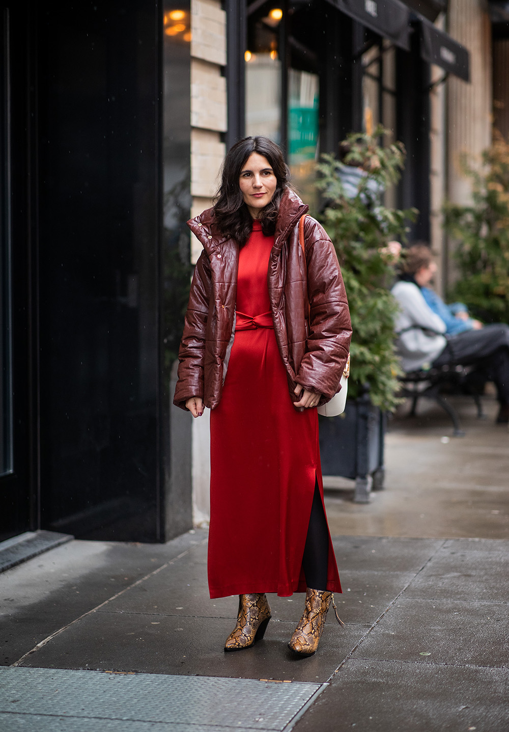 NEW YORK, NEW YORK - FEBRUARY 08: A guest wearing red dress, puffer jacket outside Nanushka during New York Fashion Week Autumn Winter 2019 on February 08, 2019 in New York City. (Photo by Christian Vierig/Getty Images)