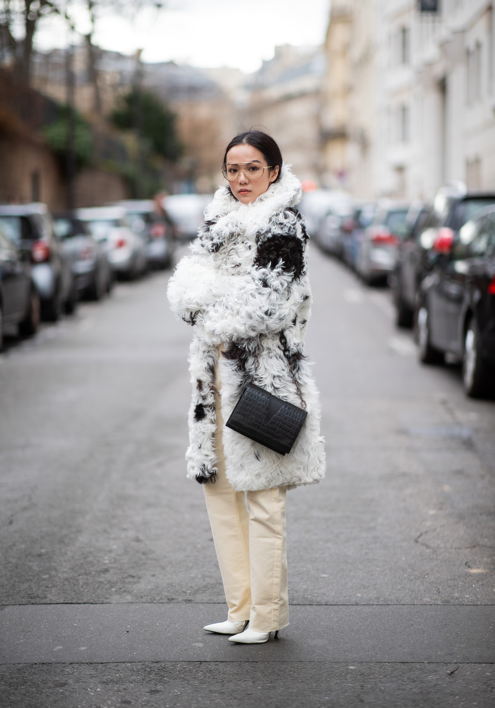 PARIS, FRANCE - MARCH 02: Yoyo Cao is seen wearing black white faux fur coat outside Elie Saab during Paris Fashion Week Womenswear Fall/Winter 2019/2020 on March 02, 2019 in Paris, France. (Photo by Christian Vierig/Getty Images)