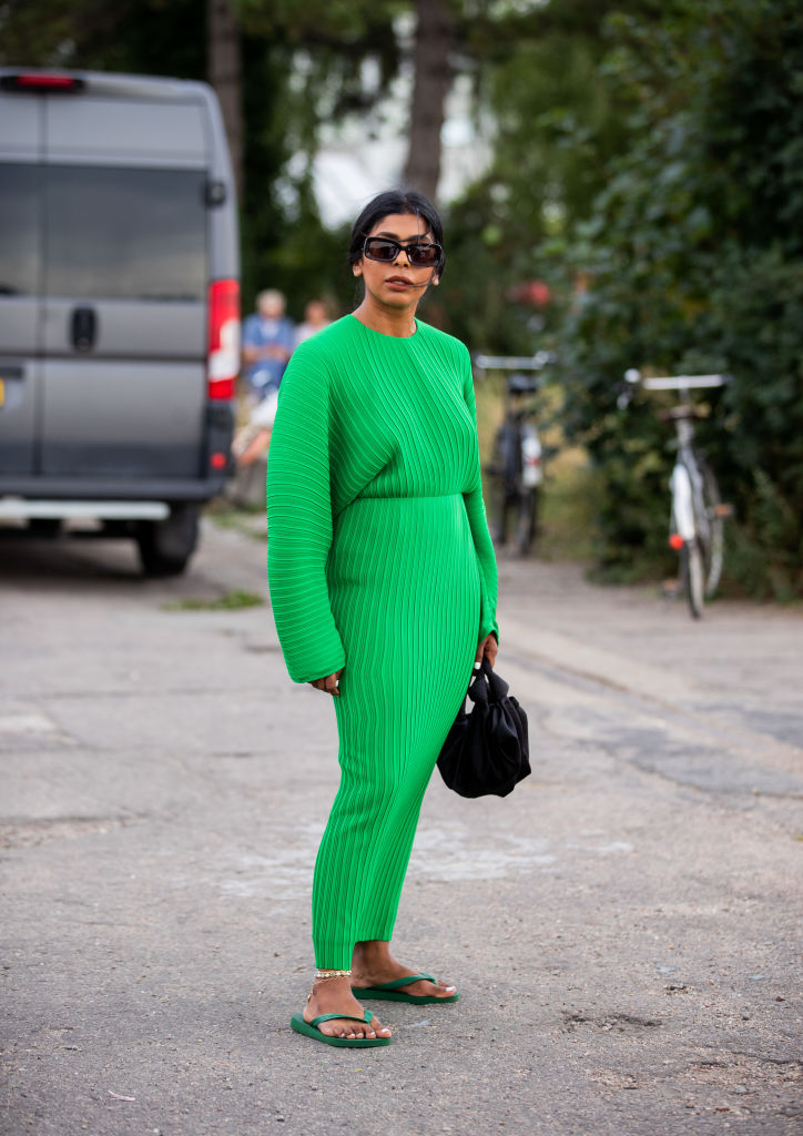 COPENHAGEN, DENMARK - AUGUST 07: A guest is seen wearing green dress, flip flops outside Cecilie Bahnsen during Copenhagen Fashion Week Spring/Summer 2020 on August 07, 2019 in Copenhagen, Denmark. (Photo by Christian Vierig/Getty Images)
