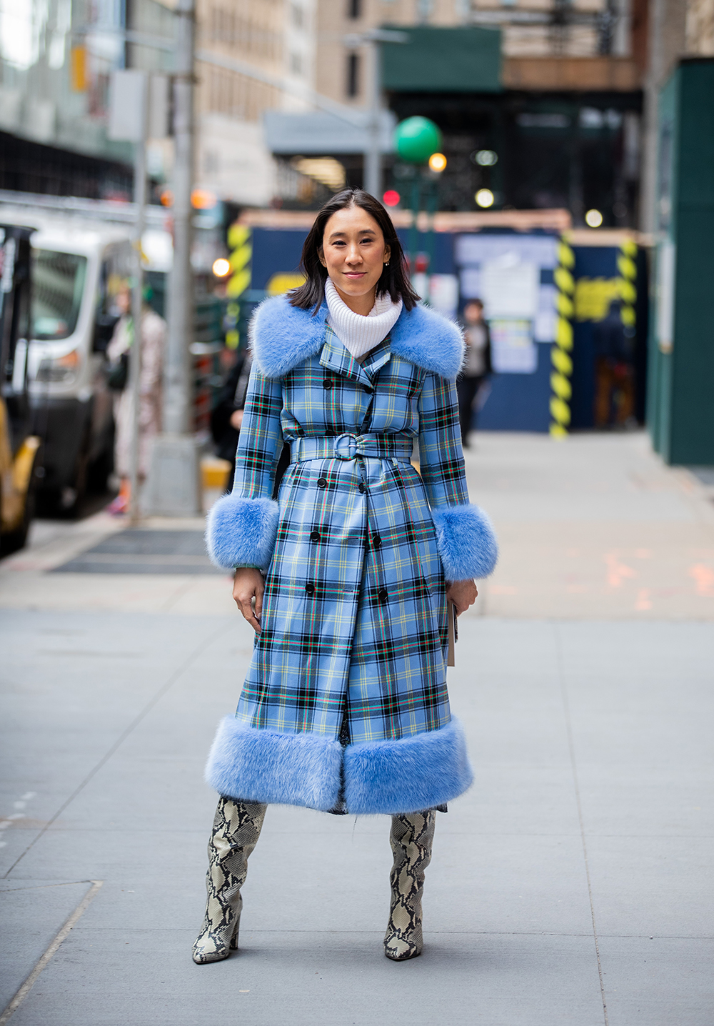 NEW YORK, NEW YORK - FEBRUARY 12: Eva Chen is seen weairng blue belted checkered coat with faux fur collar and sleeves outside Michael Kors during New York Fashion Week Fall / Winter 2020 on February 12, 2020 in New York City. (Photo by Christian Vierig/Getty Images)