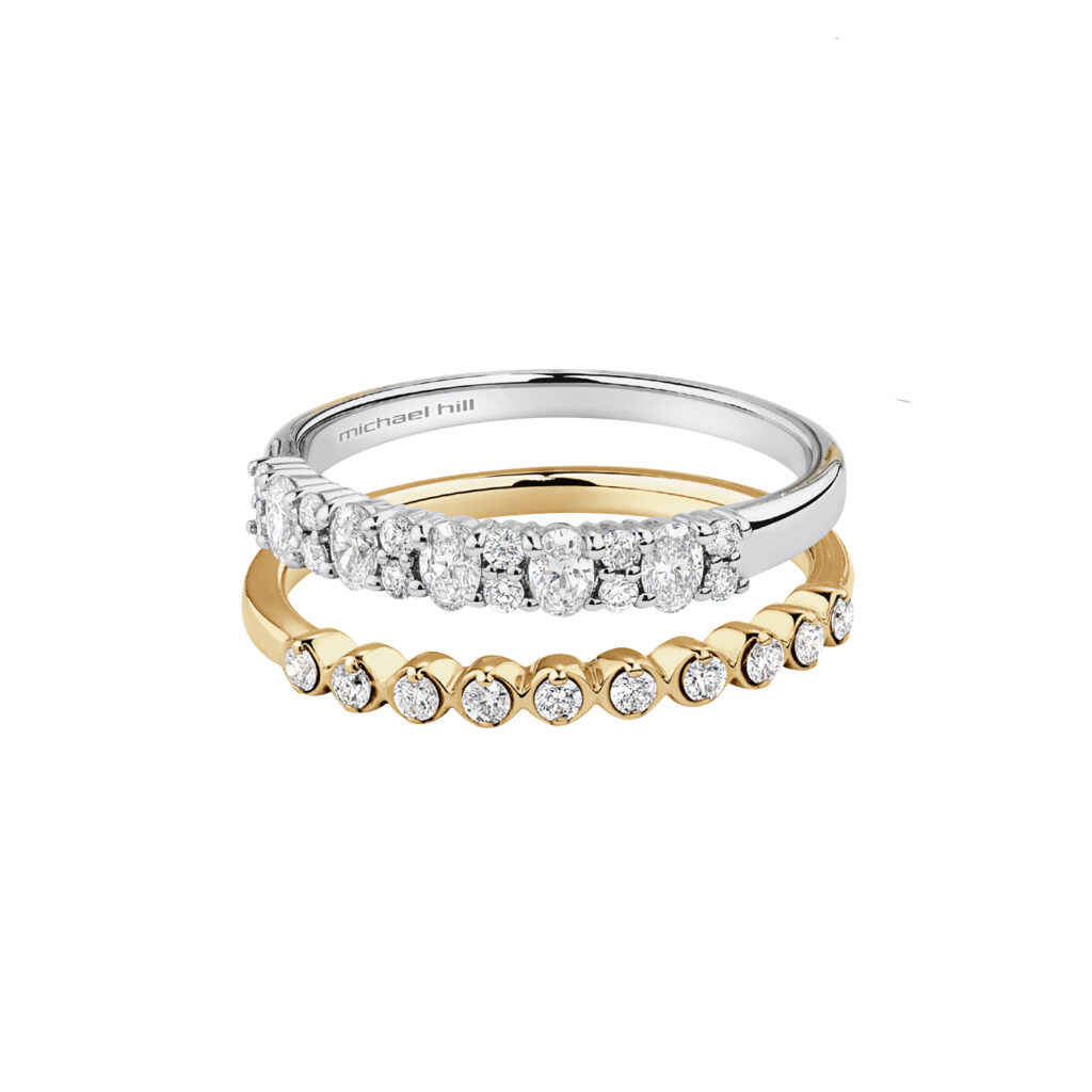 Wedding Ring with 0.46 Carat TW Diamonds in 14kt White Gold, $2699 (top), and Wedding Ring with 0.15 Carat TW Diamonds in 14kt Yellow Gold, $899 (bottom)