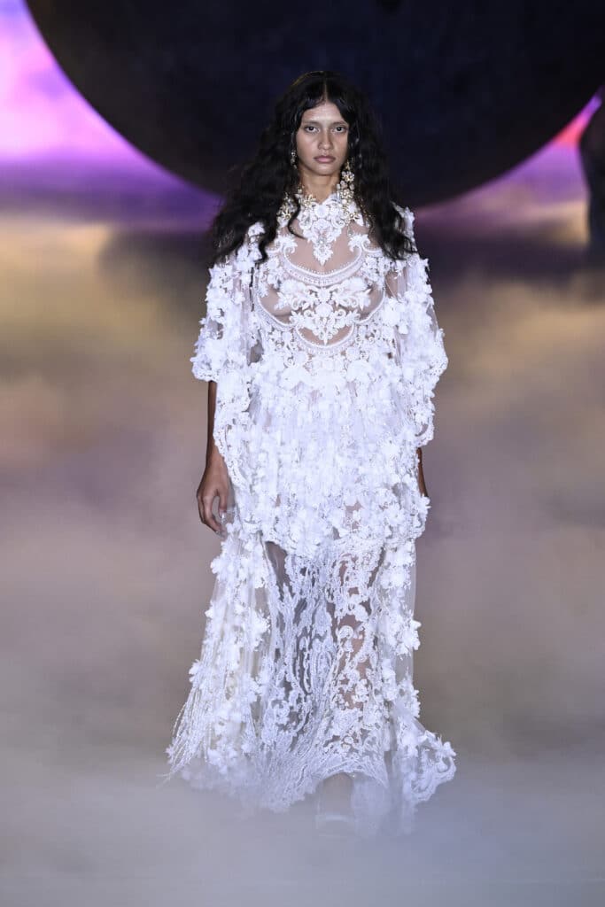 SYDNEY, AUSTRALIA - MAY 15: A model walks the runway during the Romance Was Born show during Australian Fashion Week Presented By Pandora 2024 at Carriageworks on May 15, 2024 in Sydney, Australia. (Photo by Stefan Gosatti/Getty Images for AFW)