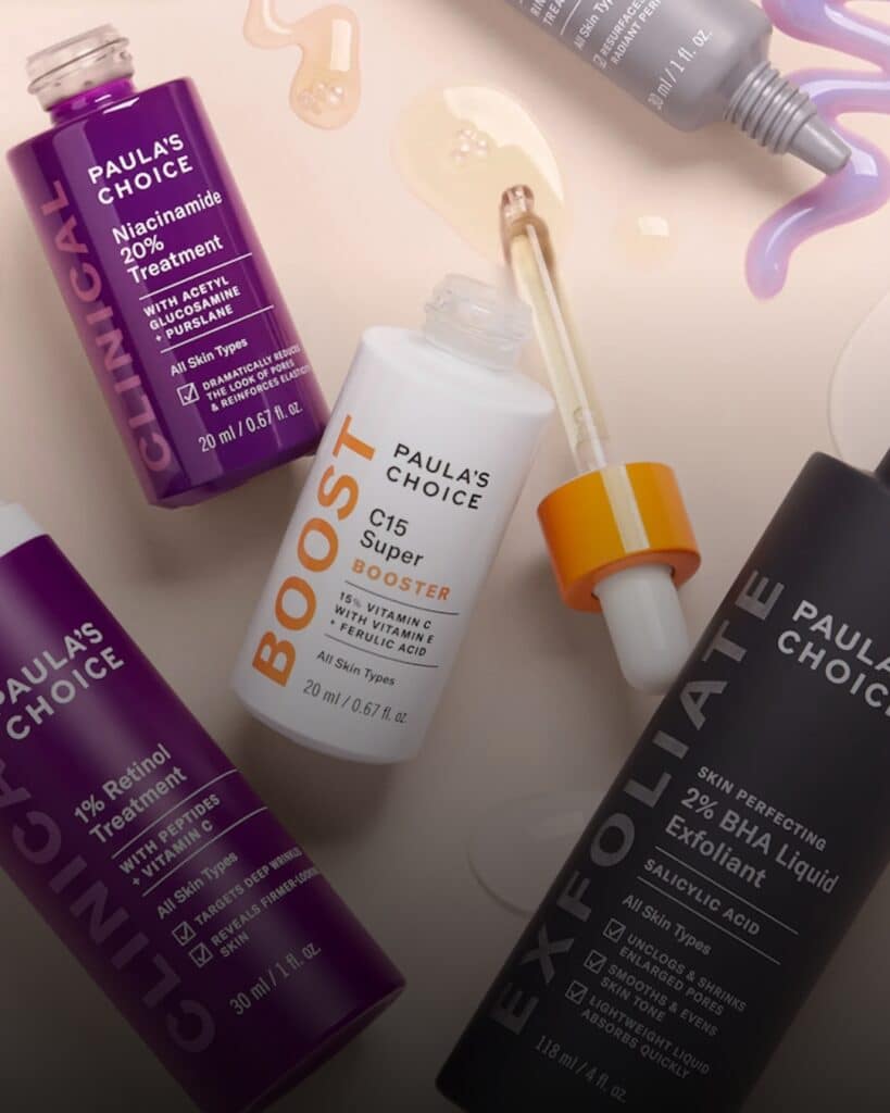 A flat lay of a skincare routine featuring Paula’s Choice products, highlighting their effectiveness and the importance of using science-backed formulations.