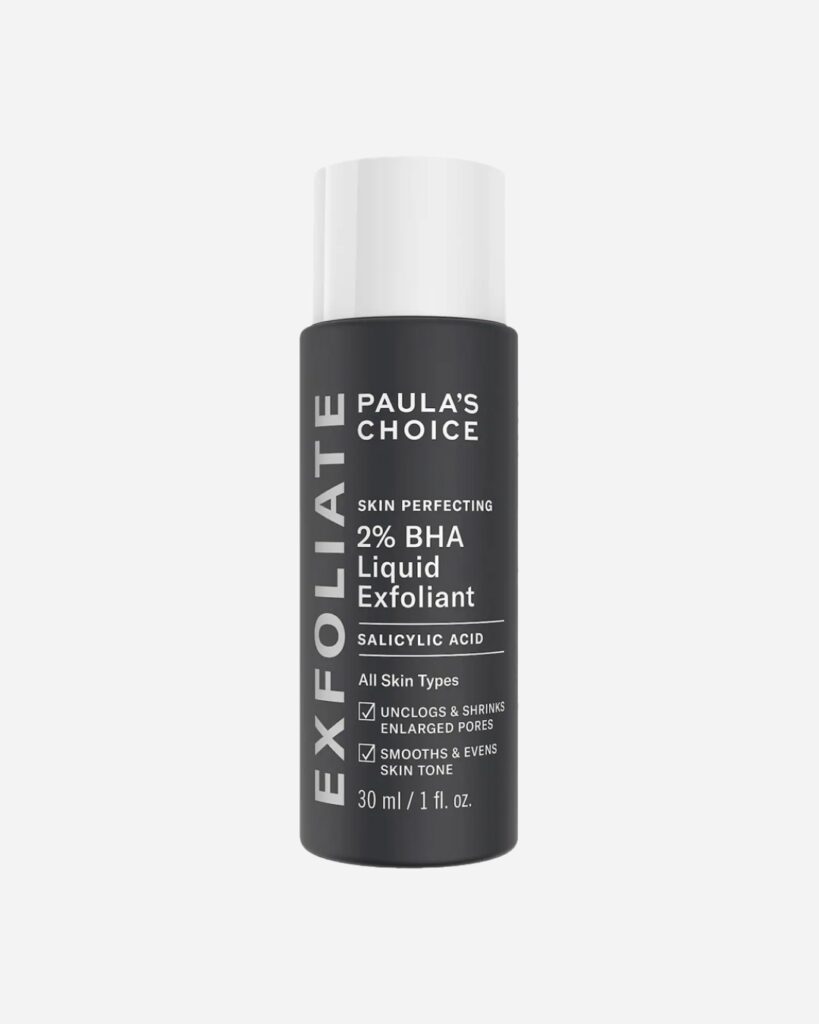 Paula's Choice Skin Perfecting 2% BHA Liquid Exfoliant: A close-up of Paula's Choice Skin Perfecting 2% BHA Liquid Exfoliant in its iconic packaging, showcasing the lightweight formula that gently exfoliates and unclogs pores for a smoother complexion.