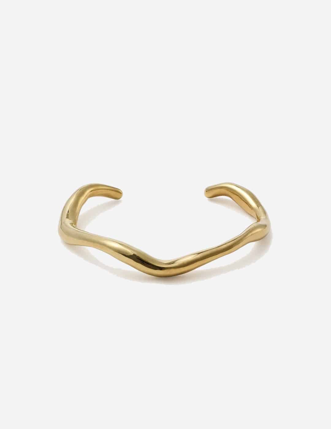 Jane Eppstein ‘Still Wave’ bangle, $535. An undulating open bangle, designed to snuggly hug your wrist. Choose from: Solid 9 karat yellow gold, or Gold plated silver.