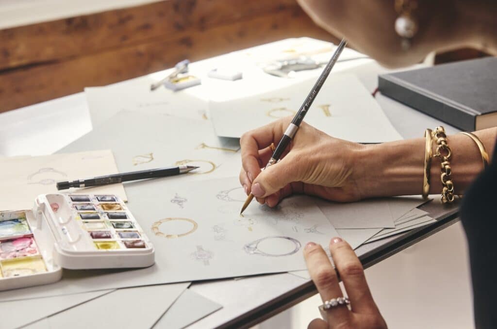 Hamish McClurg and Olivia Moor at McClurgs Jewellers, working on their timeless-meets-modern jewellery designs.