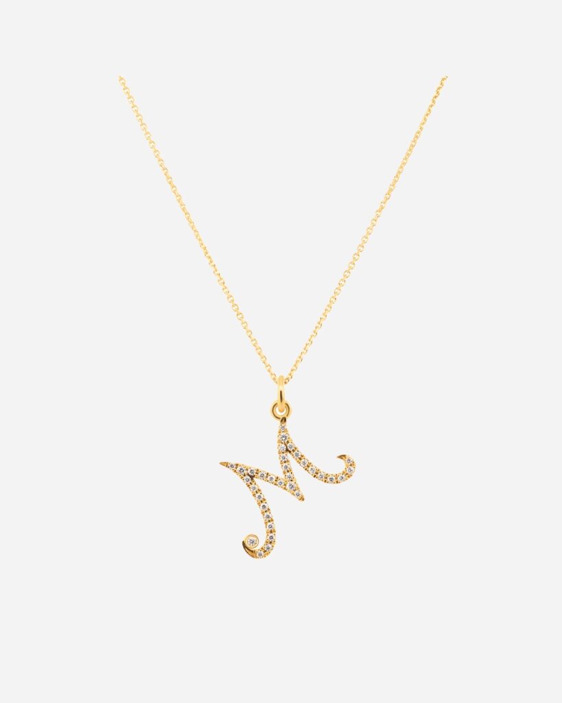 Partridge ‘Letters of Love’ yellow gold pendant, $2100.