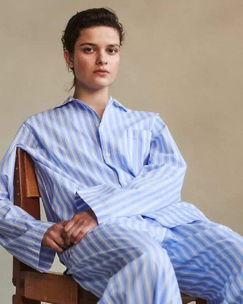 Woman wearing luxurious modal pajamas from Tekla